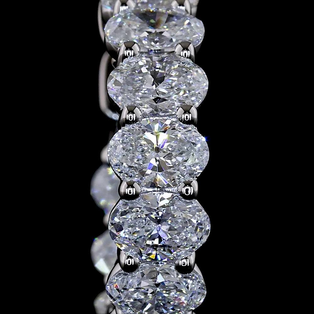 14K White Gold Oval Cut Lab Diamond Huggie Earrings - 1.90 Carats Total Diamond Weight, E-F Color, VS1 Clarity, Four-Prong Setting - Covaloro Fine Jewelry