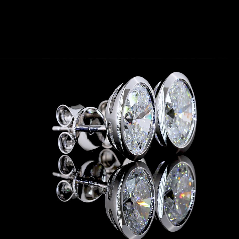 14K White Gold Oval Cut Lab Diamond Stud Earrings with Bezel Setting and Friction Backs - 2.01 Carat Total Diamond Weight (D VS1 / E VS2) - Covaloro Fine Jewelry