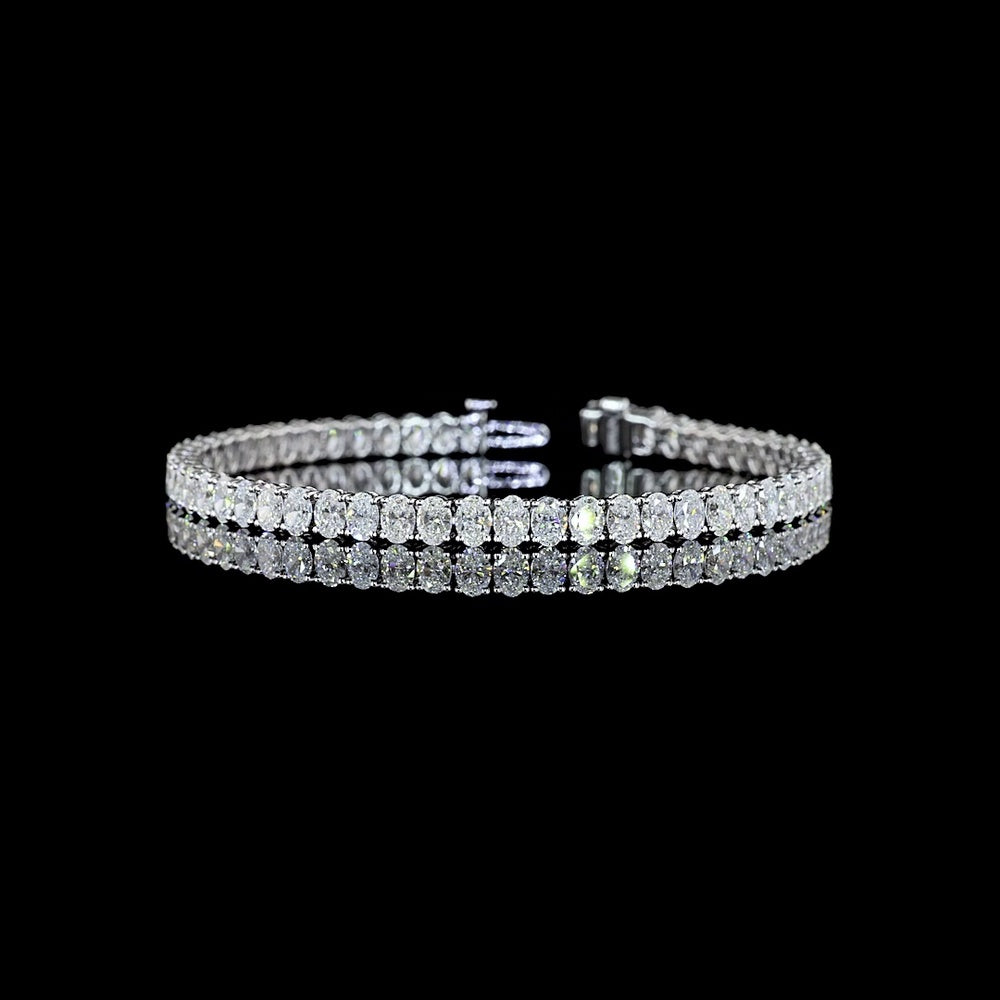 14K White Gold Oval Cut Lab Diamond Tennis Bracelet - 8.68 Carats Total Diamond Weight, 56 Stones E-F Color VS1 Clarity, Prong Set North-South Orientation - Covaloro Fine Jewelry