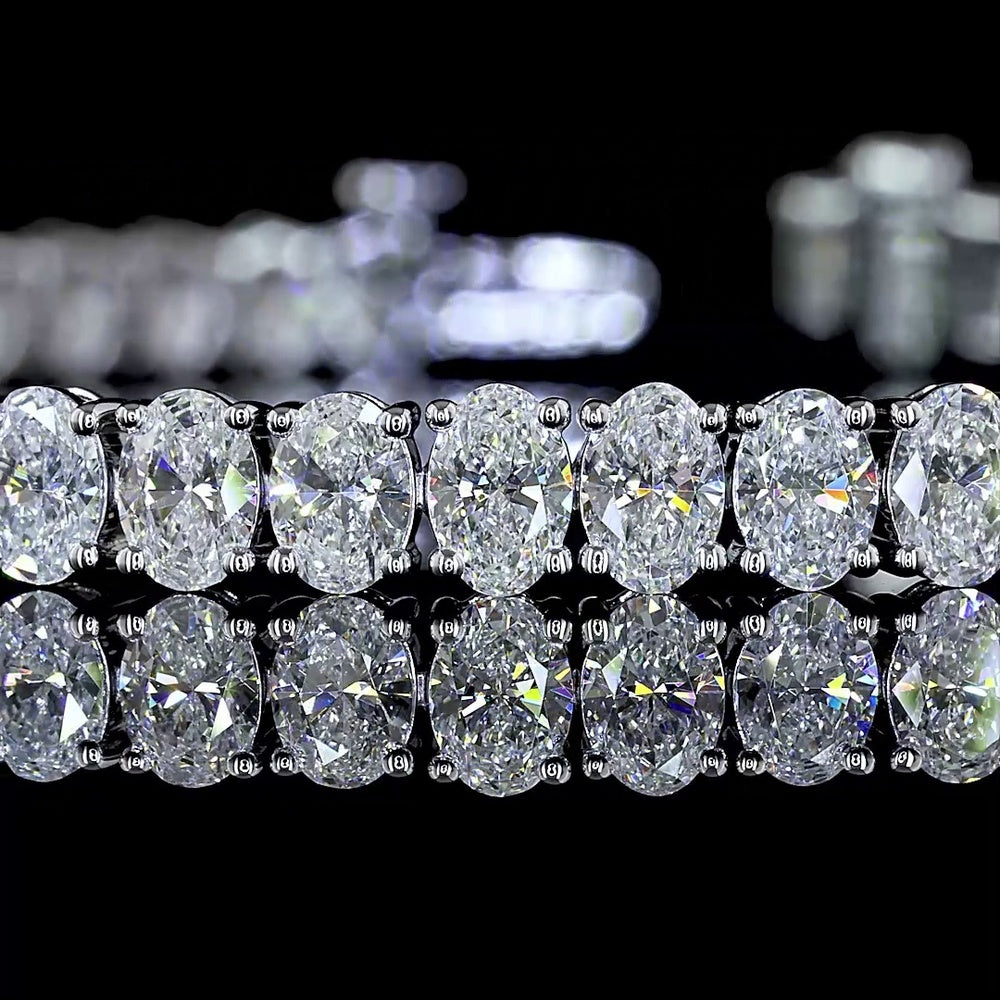 14K White Gold Oval Cut Lab Diamond Tennis Bracelet - 8.68 Carats Total Diamond Weight, 56 Stones E-F Color VS1 Clarity, Prong Set North-South Orientation - Covaloro Fine Jewelry