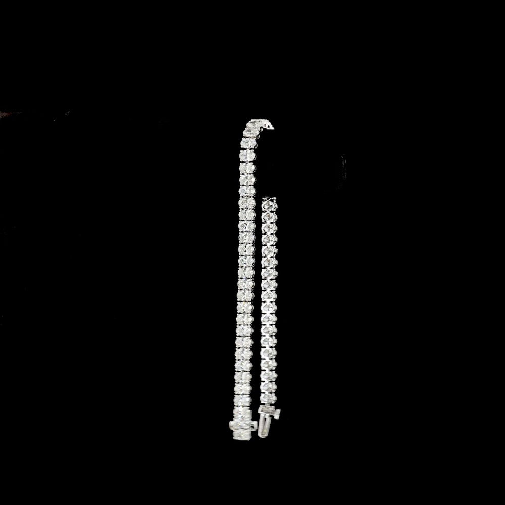 14K White Gold Oval Cut Lab Diamond Tennis Bracelet - 8.68 Carats Total Diamond Weight, 56 Stones E-F Color VS1 Clarity, Prong Set North-South Orientation - Covaloro Fine Jewelry