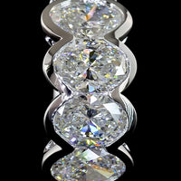 14K White Gold Oval Cut Lab-Grown Diamond Huggie Earrings with Half Bezel Setting - 2.08 Carats Total Diamond Weight - Covaloro Fine Jewelry