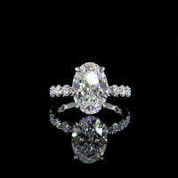 14K White Gold Oval Cut Solitaire Diamond Shank Ring - 5.47 Carat Total Diamond Weight (4.07 Carat Center D VVS2 Lab Diamond) with Brilliant Cut Side Diamonds - IGI Certified - Covaloro Fine Jewelry