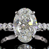 14K White Gold Oval Cut Solitaire Diamond Shank Ring with D VVS2 Center and Graduated Brilliant Side Stones - 3.95 Carat Total Weight (IGI Certified) - Covaloro Fine Jewelry