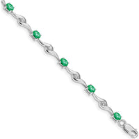 14K White Gold Oval Emerald and Round White Sapphire Curved Link Bracelet - 0.22 Carats Emerald, 0.027 Carats Sapphire Total Weight by Monteluci Fine Jewelry