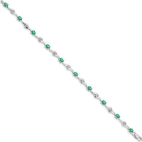 14K White Gold Oval Emerald and Round White Sapphire Curved Link Bracelet - 0.22 Carats Emerald, 0.027 Carats Sapphire Total Weight by Monteluci Fine Jewelry