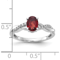 14K White Gold Oval Garnet and Diamond Ring with 14 Round Diamonds - 0.006 Carat Total Diamond Weight by 0