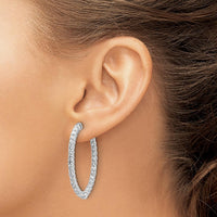 14K White Gold Oval Hoop Earrings with 64 Round Diamonds in Prong Setting - 2.6mm Each by Monteluci Fine Jewelry