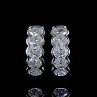14K White Gold Oval Huggie Earrings with Half-Bezel Set Lab-Grown Diamonds - 1.11 Carats Total Diamond Weight - Covaloro Fine Jewelry