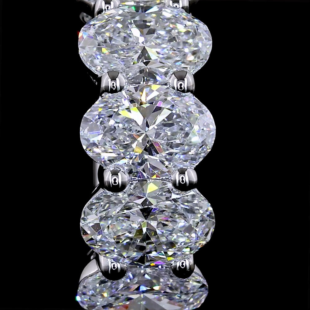 14K White Gold Oval Lab Diamond Huggie Earrings with Shared Prong Setting - 2.08 Carat Total Weight, E-F Color, VS1 Clarity - Covaloro Fine Jewelry