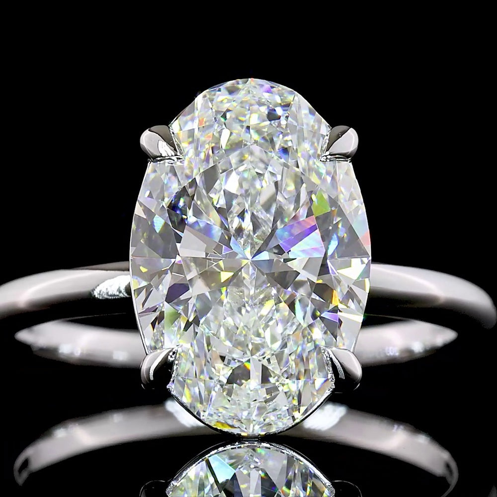 14K White Gold Oval Lab Diamond Solitaire Ring - 4.10 Carat E-F VVS2 North-South Setting with IGI Certification - Covaloro Fine Jewelry