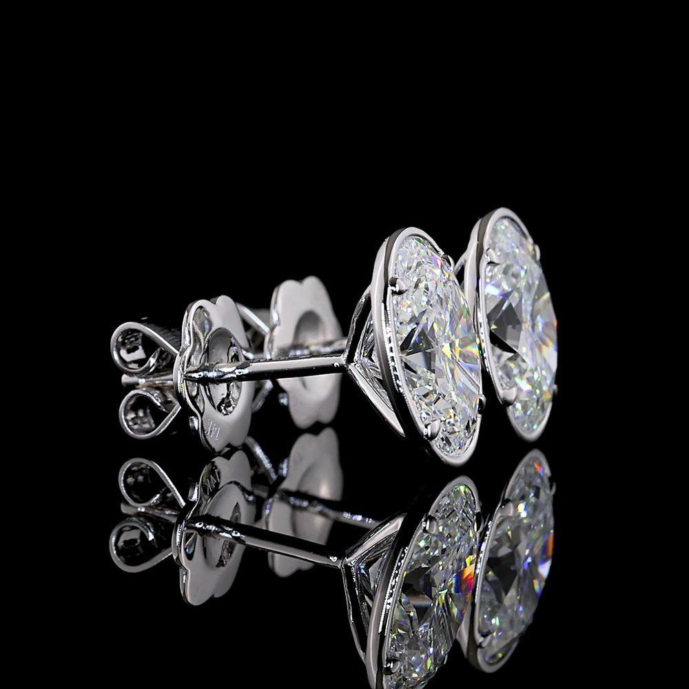 14K White Gold Oval Lab Diamond Stud Earrings with Bezel-Prong Setting - 3.07 Carats Total Diamond Weight, F Color VS1 Clarity - Covaloro Fine Jewelry
