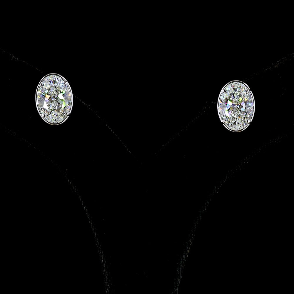 14K White Gold Oval Lab Diamond Stud Earrings with Bezel-Prong Setting - 5.13 Carat Total Weight (E-F Color, VS1 Clarity) - Covaloro Fine Jewelry