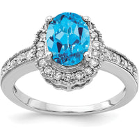 14K White Gold Oval Swiss Blue Topaz and Diamond Halo Ring - 1.35 Carat Topaz, 0.26 Carat Total Diamond Weight by Monteluci Fine Jewelry