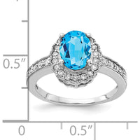 14K White Gold Oval Swiss Blue Topaz and Diamond Halo Ring - 1.35 Carat Topaz, 0.26 Carat Total Diamond Weight by Monteluci Fine Jewelry