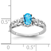 14K White Gold Oval Swiss Blue Topaz & Diamond Ring - 0.55 Carat Topaz, 0.034 Carat Diamonds by Monteluci Fine Jewelry