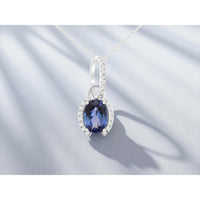 14K White Gold Oval Tanzanite and Diamond Halo Pendant Necklace - 0.84 Carat Tanzanite with 0.10 Carat Diamond Accents - Royal Jewelry