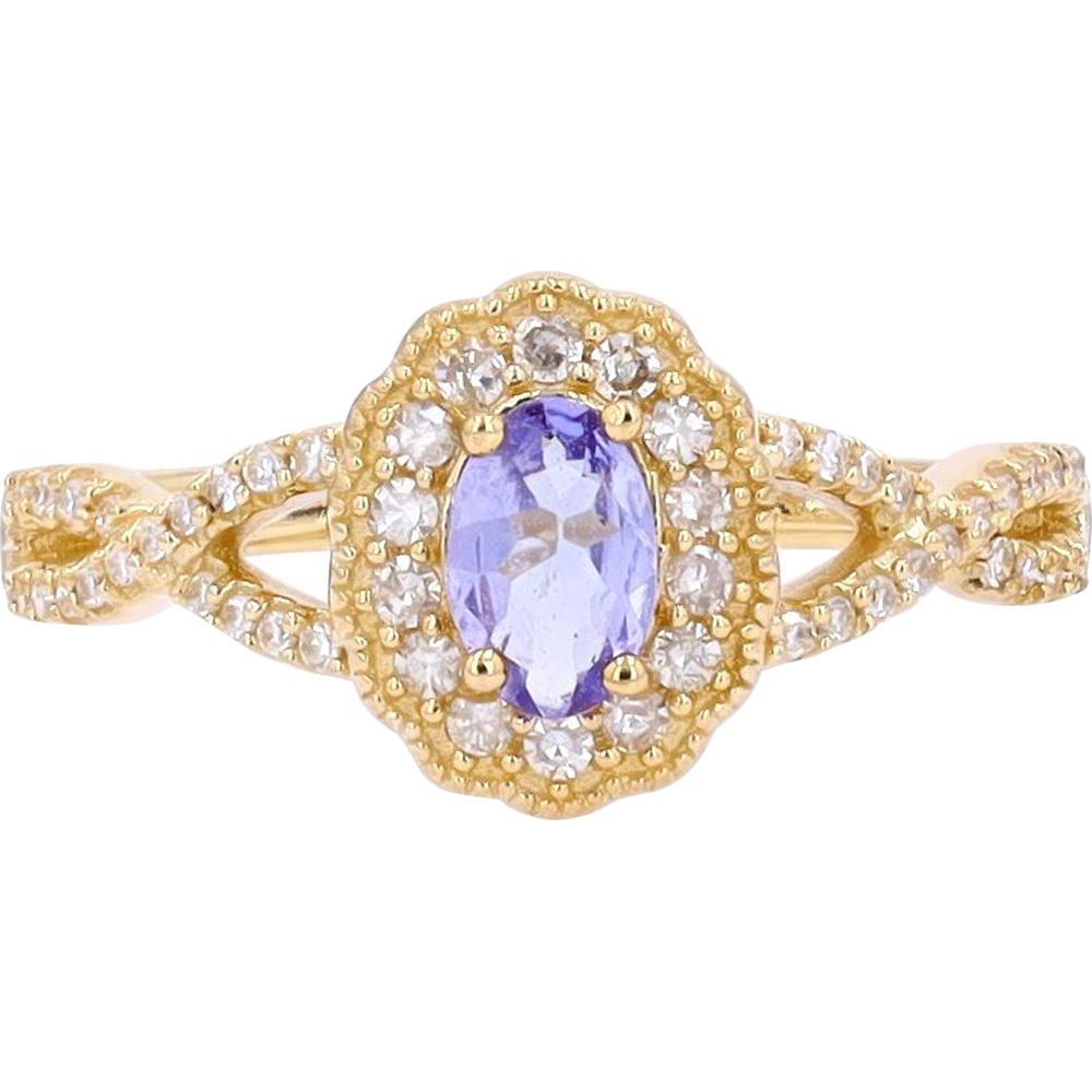 14K White Gold Oval Tanzanite and Diamond Halo Ring with Split-Shank Milgrain Design - 0.25 Carats Total Diamond Weight