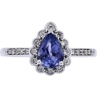 14K White Gold Pear-Cut Tanzanite Ring with Diamond Halo and Milgrain Detail - 0.75 Carat Tanzanite and 0.18 Carat Total Diamond Weight