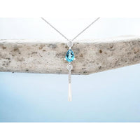 14K White Gold Pear Shape Blue Topaz and Diamond Drop Pendant with 0.80 Carat Blue Topaz and 0.14 Carat Total Diamond Weight - Royal Jewelry