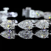 14K White Gold Pear Shape East-West Tennis Bracelet with Prong Set Lab Grown E-F VS1 Diamonds - 12.24 Carat Total Weight - Covaloro Fine Jewelry