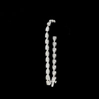 14K White Gold Pear Shape East-West Tennis Bracelet with Prong Set Lab Grown E-F VS1 Diamonds - 12.24 Carat Total Weight - Covaloro Fine Jewelry