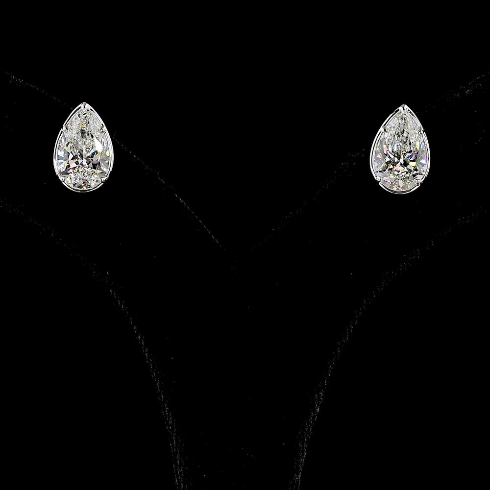 14K White Gold Pear Shape Lab Diamond Stud Earrings with Bezel-Prong Setting - 4.00 Carat Total Weight, E-F Color, VS1 Clarity - Covaloro Fine Jewelry