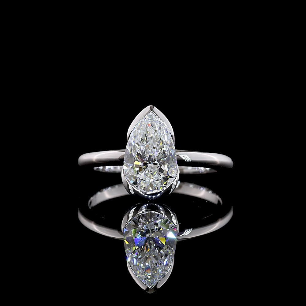 14K White Gold Pear-Shape Solitaire Ring with Half Bezel Setting and 1.54 Carat Lab Diamond (E-F Color, VS1 Clarity) - Covaloro Fine Jewelry