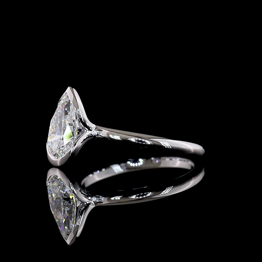 14K White Gold Pear-Shape Solitaire Ring with Half Bezel Setting and 1.54 Carat Lab Diamond (E-F Color, VS1 Clarity) - Covaloro Fine Jewelry