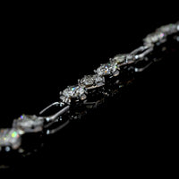14K White Gold Pear-Shape Station Bracelet with Black Rhodium Prong Details and 16 Lab-Grown Diamonds - 2.99 Carat Total Weight - Covaloro Fine Jewelry