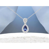 14K White Gold Pear Shape Tanzanite and Diamond Halo Pendant with Diamond Bail - 0.45 Carat Tanzanite and 0.20 Carat Total Diamond Weight - Royal Jewelry