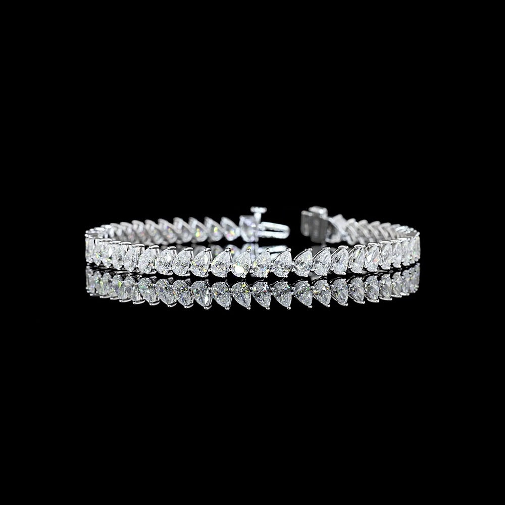14K White Gold Pear Shape Tennis Bracelet with Incline-Set Lab Grown Diamonds (E-F VS1) - 8.69 Carat Total Weight - Covaloro Fine Jewelry