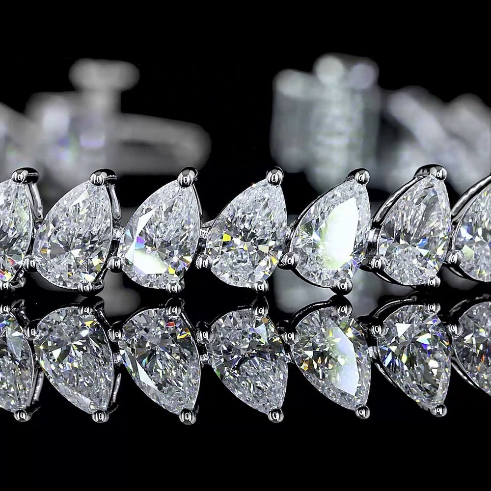 14K White Gold Pear Shape Tennis Bracelet with Incline-Set Lab Grown Diamonds (E-F VS1) - 8.69 Carat Total Weight - Covaloro Fine Jewelry