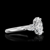 14K White Gold Pear Shape Three Stone Ring with Lab Grown Diamonds - 0.68 Total Carat Weight, E-F Color VS1 Clarity - Covaloro Fine Jewelry