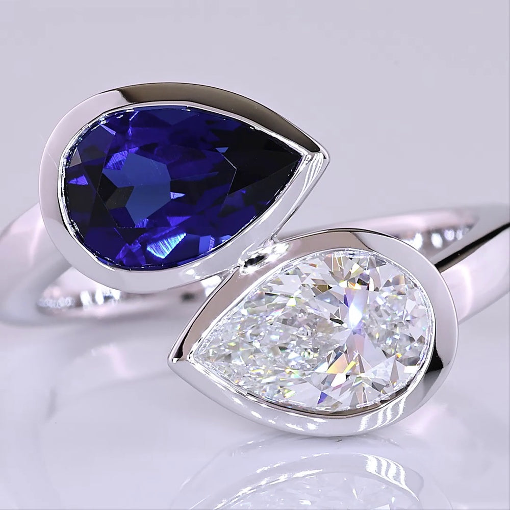 14K White Gold Pear Shape Toi et Moi Ring with Bezel Set Lab-Grown Blue Sapphire and Lab-Grown Diamond - 2.42 Carats Total Gem Weight - Covaloro Fine Jewelry