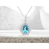 14K White Gold Pear-Shaped Blue Topaz Pendant with Diamond Halo - 1.15 Carat Blue Topaz and 0.33 Carat Total Diamond Weight - Royal Jewelry