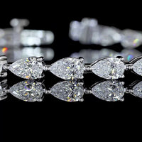 14K White Gold Pear-Shaped Lab Diamond Tennis Bracelet with East-West Prong Setting - 6.52 Carat Total Weight - Covaloro Fine Jewelry