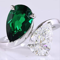 14K White Gold Pear Shaped Toi et Moi Ring with 1.75 Carats Lab-Grown Emerald and Lab-Grown Diamond in E VVS2 Quality - Covaloro Fine Jewelry