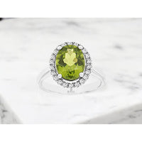 14K White Gold Peridot & Diamond Halo Ring - 2.80 Carats Peridot, 0.25 Carats Total Diamond Weight