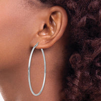 14K White Gold Polished 60mm Tube Hoop Earrings - Elegant and Timeless Design by 0