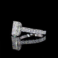14K White Gold Radiant Cut Lab Diamond Solitaire Shank Ring featuring E VVS2 3.11 Carats Center Diamond and 0.94 Carats Round Brilliant Side Stones - 4.05 Carats Total Diamond Weight - Covaloro Fine Jewelry