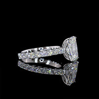 14K White Gold Radiant Cut Lab Diamond Solitaire Shank Ring featuring E VVS2 3.11 Carats Center Diamond and 0.94 Carats Round Brilliant Side Stones - 4.05 Carats Total Diamond Weight - Covaloro Fine Jewelry