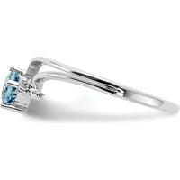 14K White Gold Ring with 0.30 Carat Round Swiss Blue Topaz and 0.01 Carat Diamond Accent by Monteluci Fine Jewelry