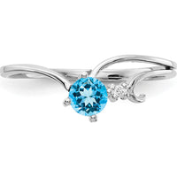 14K White Gold Ring with 0.30 Carat Round Swiss Blue Topaz and 0.01 Carat Diamond Accent by Monteluci Fine Jewelry
