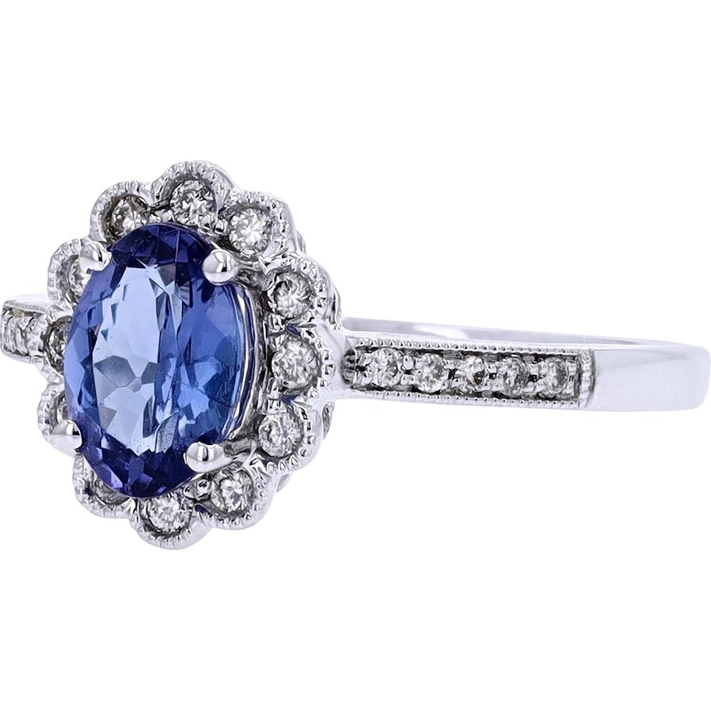 14K White Gold Ring with 0.80 Carats Oval Tanzanite and 0.18 Carats Diamond Halo