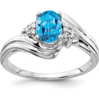 14K White Gold Ring with 1.00 Carat Oval Swiss Blue Topaz and 0.01 Carat Diamond Accents by Monteluci Fine Jewelry