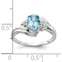 14K White Gold Ring with 1.00 Carat Oval Swiss Blue Topaz and 0.01 Carat Diamond Accents by Monteluci Fine Jewelry