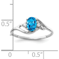 14K White Gold Ring with 6x4mm Oval Swiss Blue Topaz and Round Diamond Accents - 0.55 Carat Total Gem Weight by Monteluci Fine Jewelry