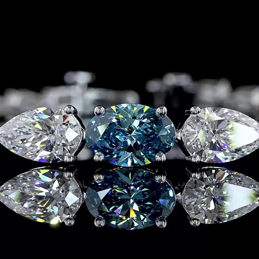 14K White Gold Riviera Bracelet with 1.01 Carats Fancy Vivid Blue Oval Lab Diamond and Pear Shape White Diamonds - 8.35 Carats Total Diamond Weight - Covaloro Fine Jewelry