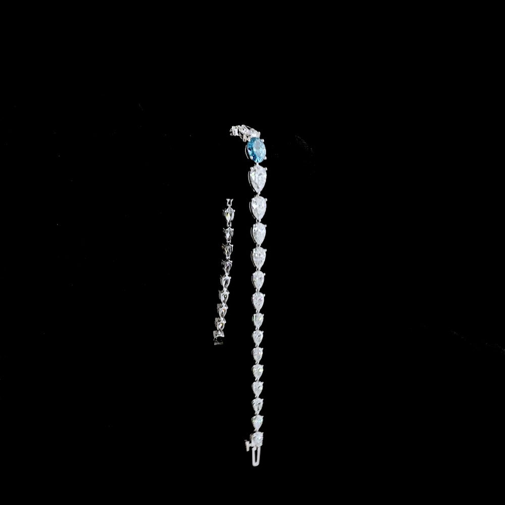 14K White Gold Riviera Bracelet with 1.01 Carats Fancy Vivid Blue Oval Lab Diamond and Pear Shape White Diamonds - 8.35 Carats Total Diamond Weight - Covaloro Fine Jewelry
